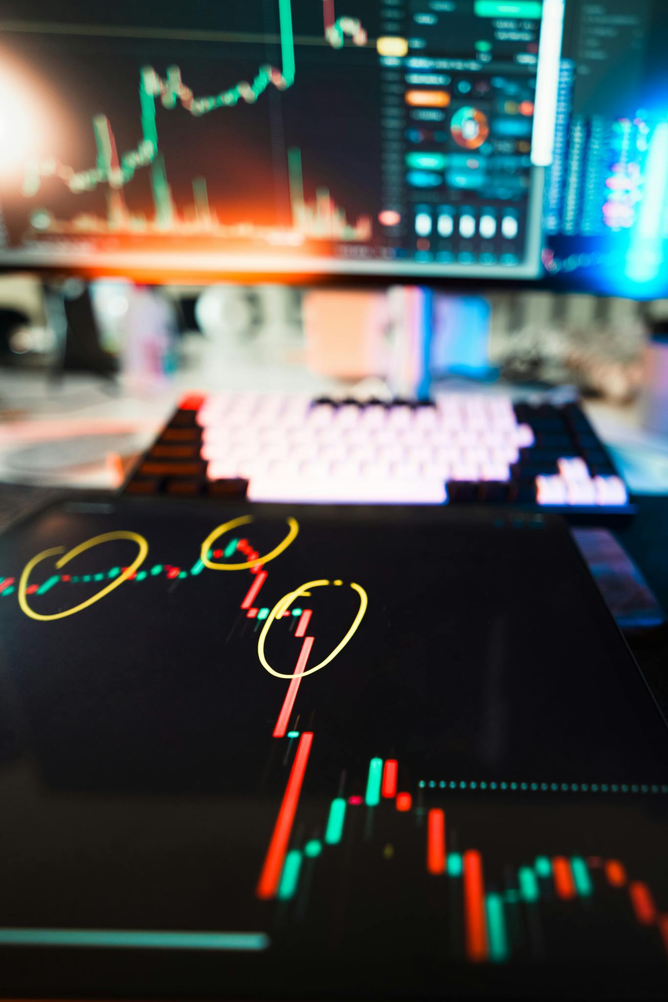 Close-up of cryptocurrency market data visualization on screens with highlighted trends and charts.